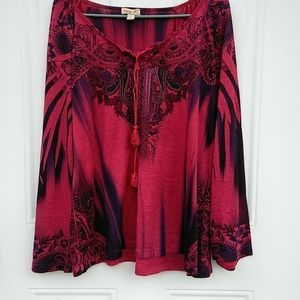 Hippy looking shirt.winged sleeves